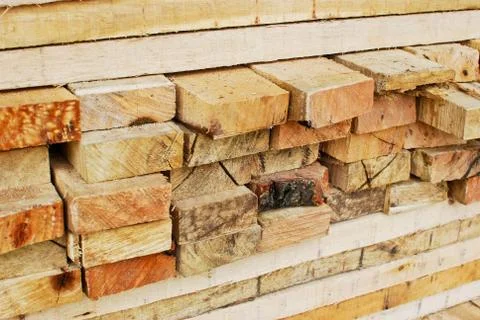 Stack of lumber in logs storage closeup Stock Photos