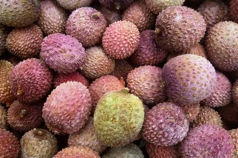 Stack of Lychees on a market stall Stock Photos