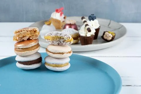 Stack of macarons filled with chocolate ganache, dulce de leche and passion f Stock Photos