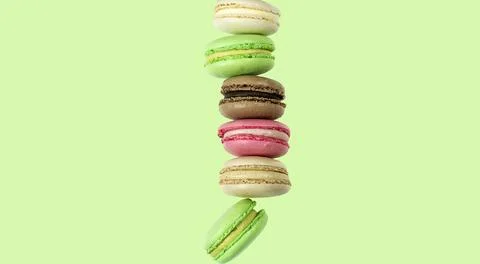 Stack of macaroon brownies on a green mint background in the middle Stock Photos