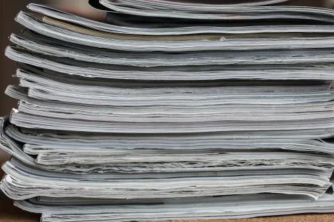 A stack of magazines, close-up macro filled the frame. A background for Stock Photos
