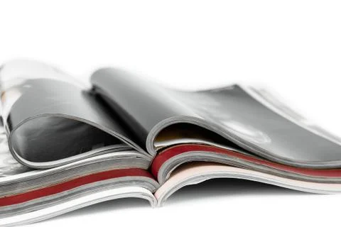 Stack of magazines on isolated white Stock Photos