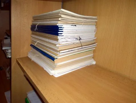 A stack of magazines on a shelf accounting Stock Photos