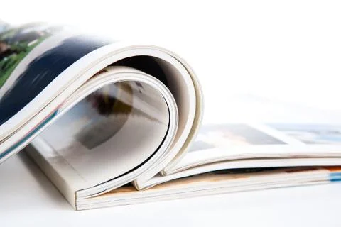 Stack of magazines on a white background Stock Photos