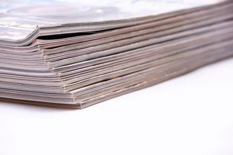 Stack of magazines on white background. Stock Photos
