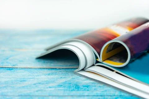 Stack magazines on wooden table Stock Photos
