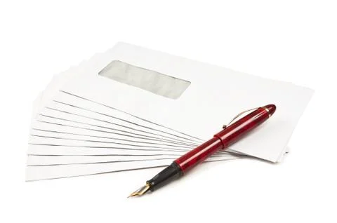 Stack of mail envelopes and a pen Stock Photos