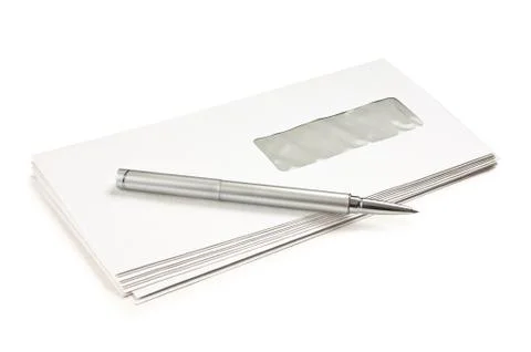 Stack of mail envelopes and a pen Stock Photos