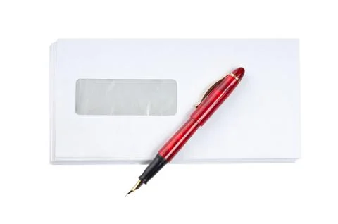 Stack of mail envelopes and a pen Stock Photos