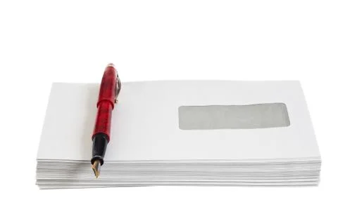 Stack of mail envelopes and a pen Stock Photos