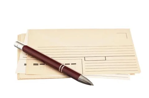 Stack of mail envelopes and a pen Stock Photos