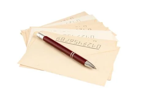 Stack of mail envelopes and a pen Foto stock
