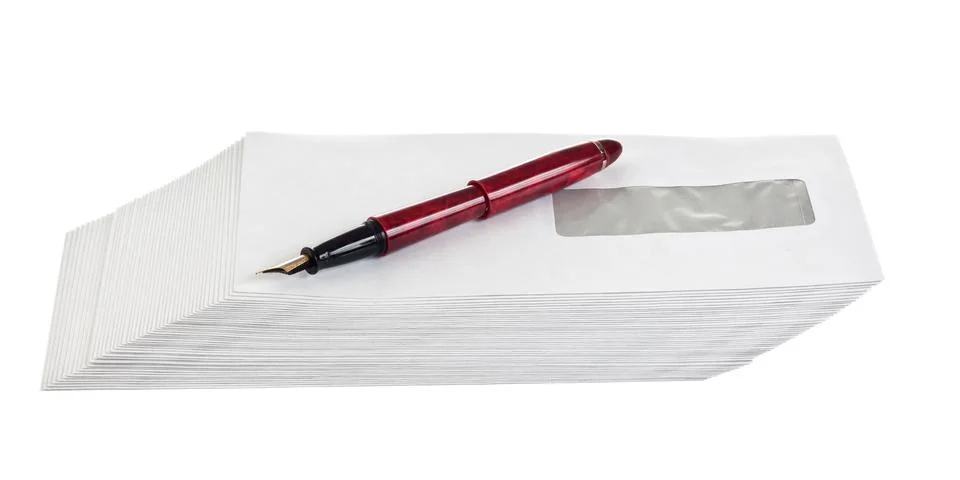 Stack of mail envelopes and a pen Stock Photos