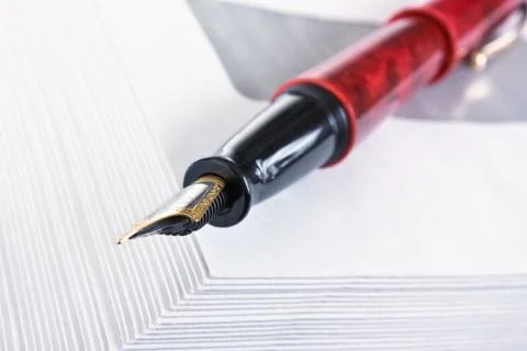 Stack of mail envelopes and a pen Stock Photos