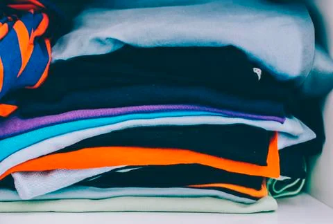 Stack of the man cloth in room Stock Photos