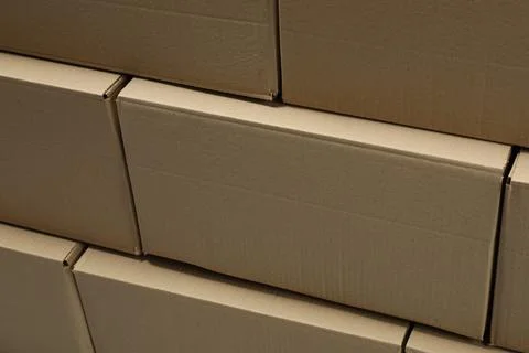 Stack of many closed cardboard boxes as background Stock Photos