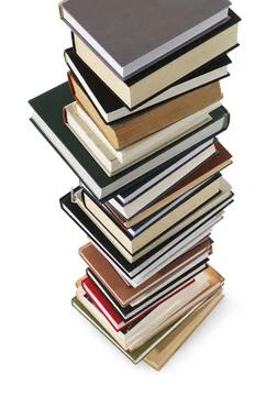 Stack of many different books isolated on white Stockfoto's