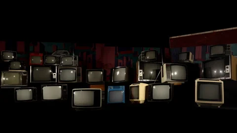 Stack of Many Old Televisions of Different Sizes and Eras in a Room - 4K Stock Footage 306088343