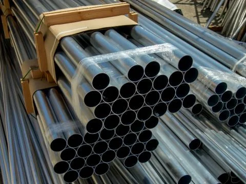 Stack of Many Pipes at the Construction Site Stock Photos