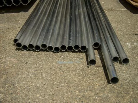 Stack of Many Pipes at the Construction Site Stock Photos