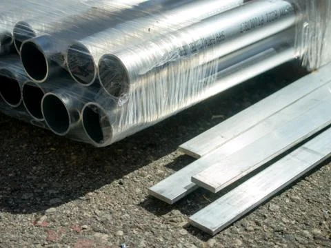 Stack of Many Pipes at the Construction Site Stock Photos