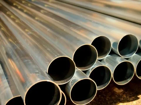 Stack of Many Pipes at the Construction Site Stock Photos