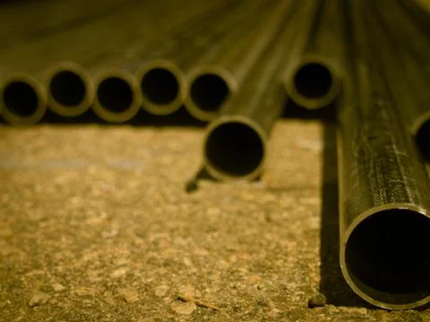 Stack of Many Pipes at the Construction Site Stock Photos