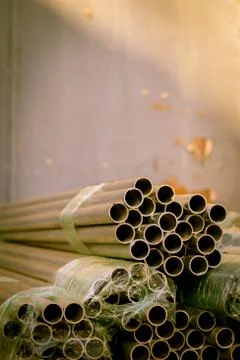 Stack of Many Pipes at the Construction Site Stock Photos