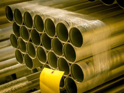 Stack of Many Pipes at the Construction Site Stock Photos