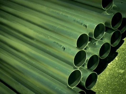 Stack of Many Pipes at the Construction Site Stock Photos