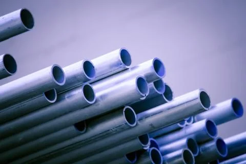 Stack of Many Pipes at the Construction Site Stock Photos