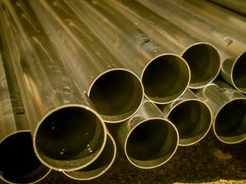 Stack of Many Pipes at the Construction Site Stock Photos