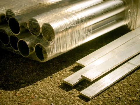 Stack of Many Pipes at the Construction Site Stock Photos