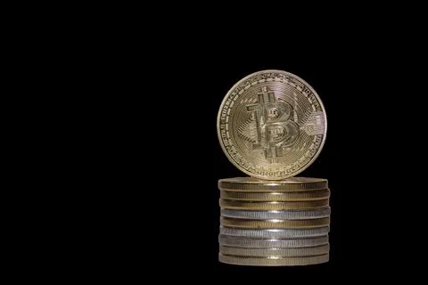 Stack of many valueable bitcoin from crypto currency with black Stock Photos
