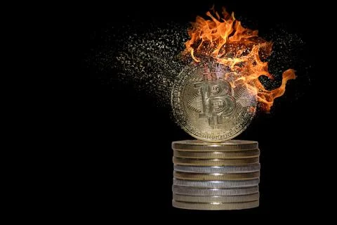 Stack of many valueable burning decomposes and dissolves bitcoin from crypto  Stock Photos
