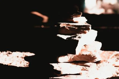 Stack of marble rock plates , dark image black and white with harsh dark shadows Foto stock