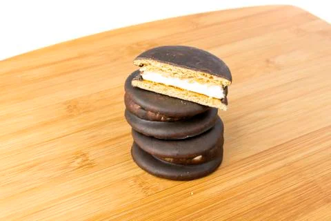 Stack of marshmallow chocolate covered sandwich cookies Stock Photos