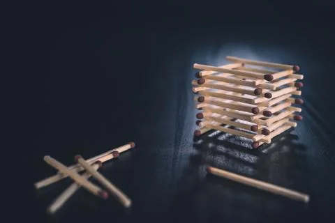 Stack of matches with some laying around Stock Photos