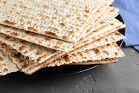 Stack of matzos on grey table, closeup 스톡 사진