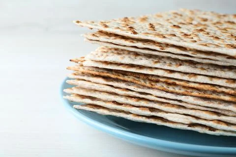 Stack of matzos on white table, closeup 스톡 사진