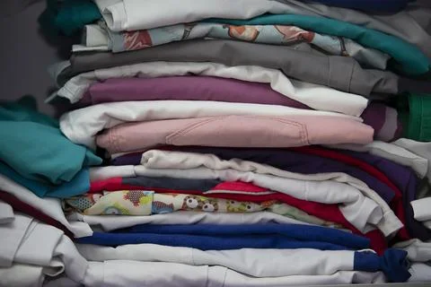 A stack of medically ironed clean clothes. Foto stock