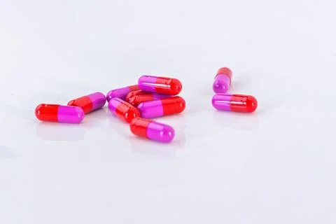 Stack of medication pills - red Stock Photos