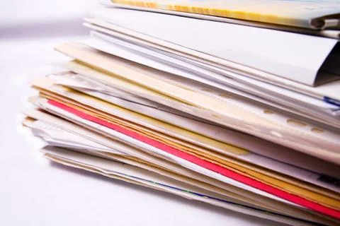 Stack of messy document folders Stock Photos