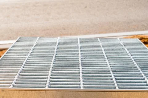 Stack of metal grate sections Stock Photos