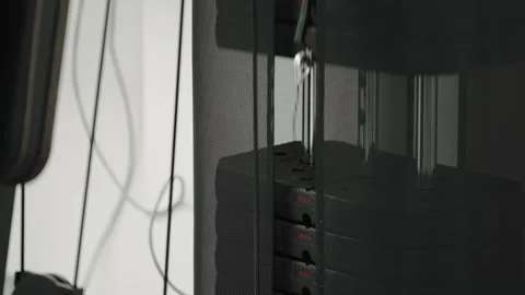 Stack of metal objects in machine moves up and down. Strength training machine Stock Footage 346594752