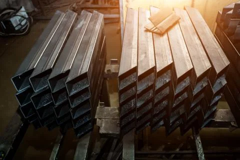 Stack of metal profile cut at an angle. welding work.. Stock Photos