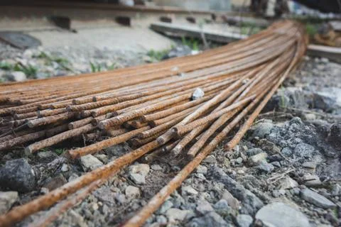 Stack of the metal rusty reinforcement bars. Stock Photos