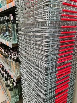 Stack of metal shopping baskets Stock Photos