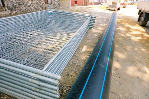 Stack of metal wire fence at the construction site Stock Photos