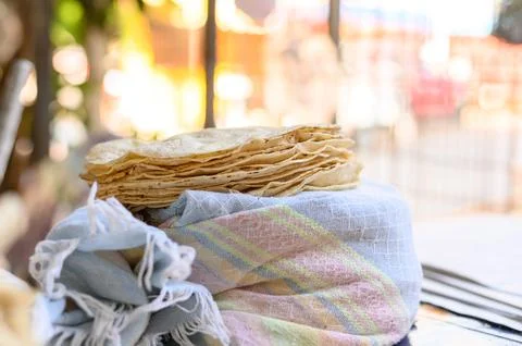Stack of Mexican flatbreads on wrapped fabric Stock Photos